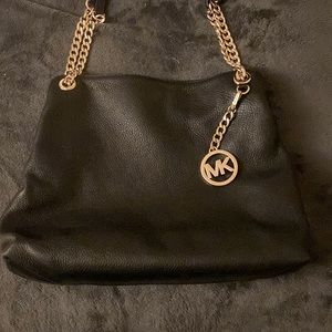 michael kohrs black leather gold chain link shoulder bag